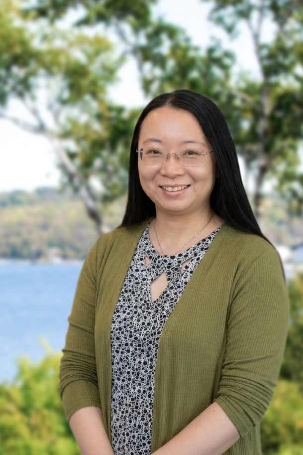 Dr Mindy Da, General Practitioner at South Steyne Medical Centre in Manly, smiling in her consultation room.
